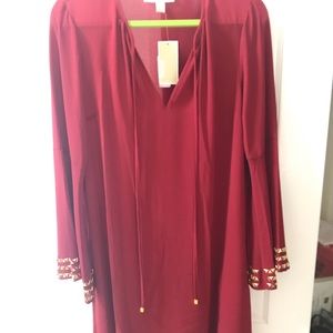 MK red dress gold detail